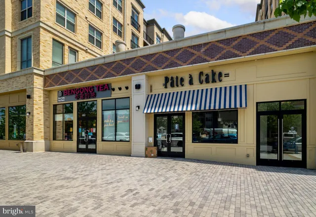 a view of a building with sitting area