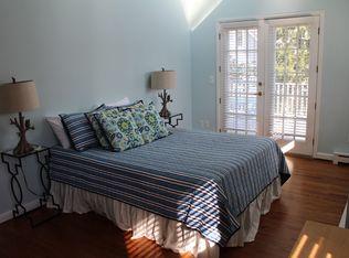 9 Juniper Road Rowayton, CT 06853 - Photo 12 of 25 a bedroom with a bed and window