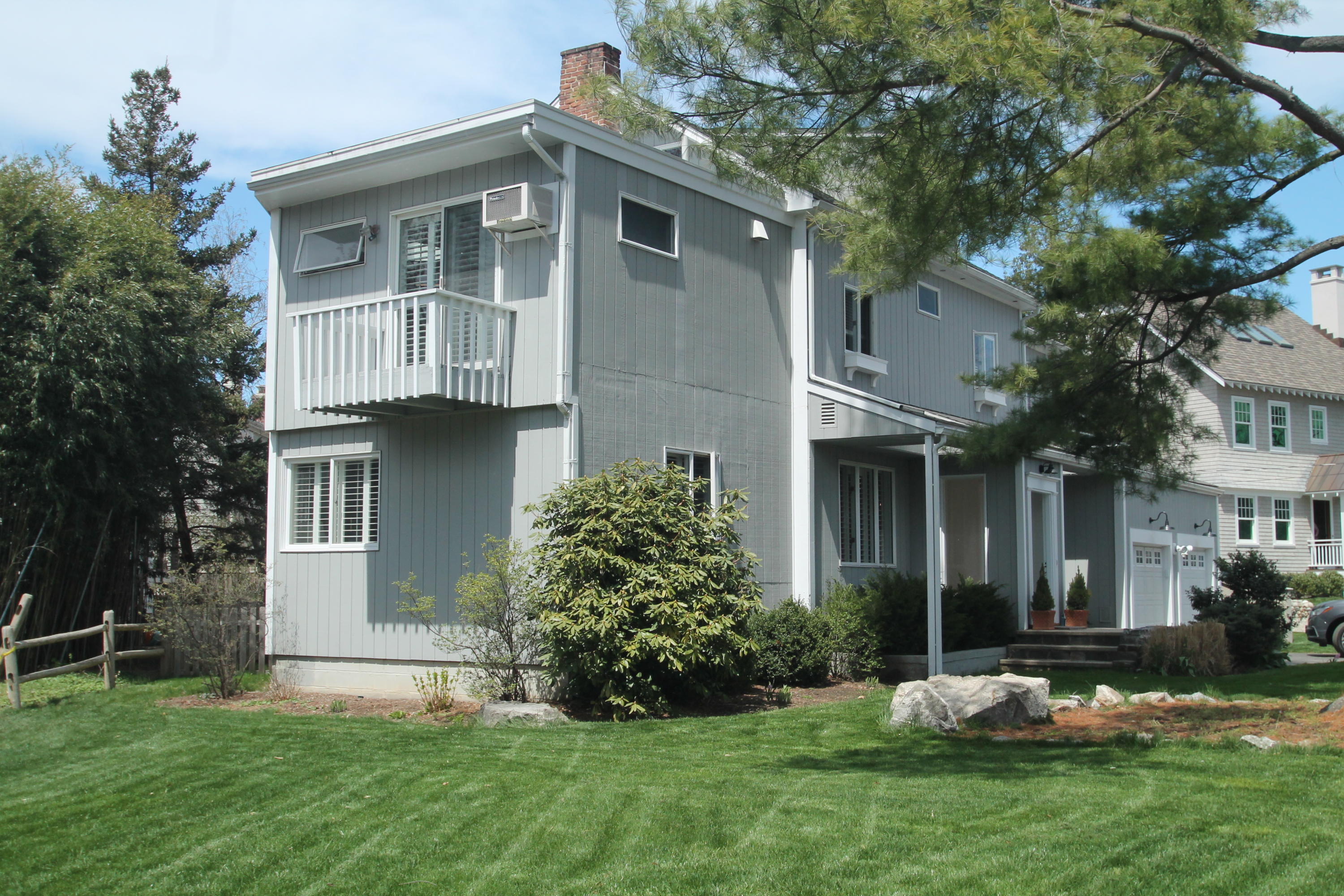 9 Juniper Road Rowayton, CT 06853 - Photo 24 of 25 a front view of a house with a yard