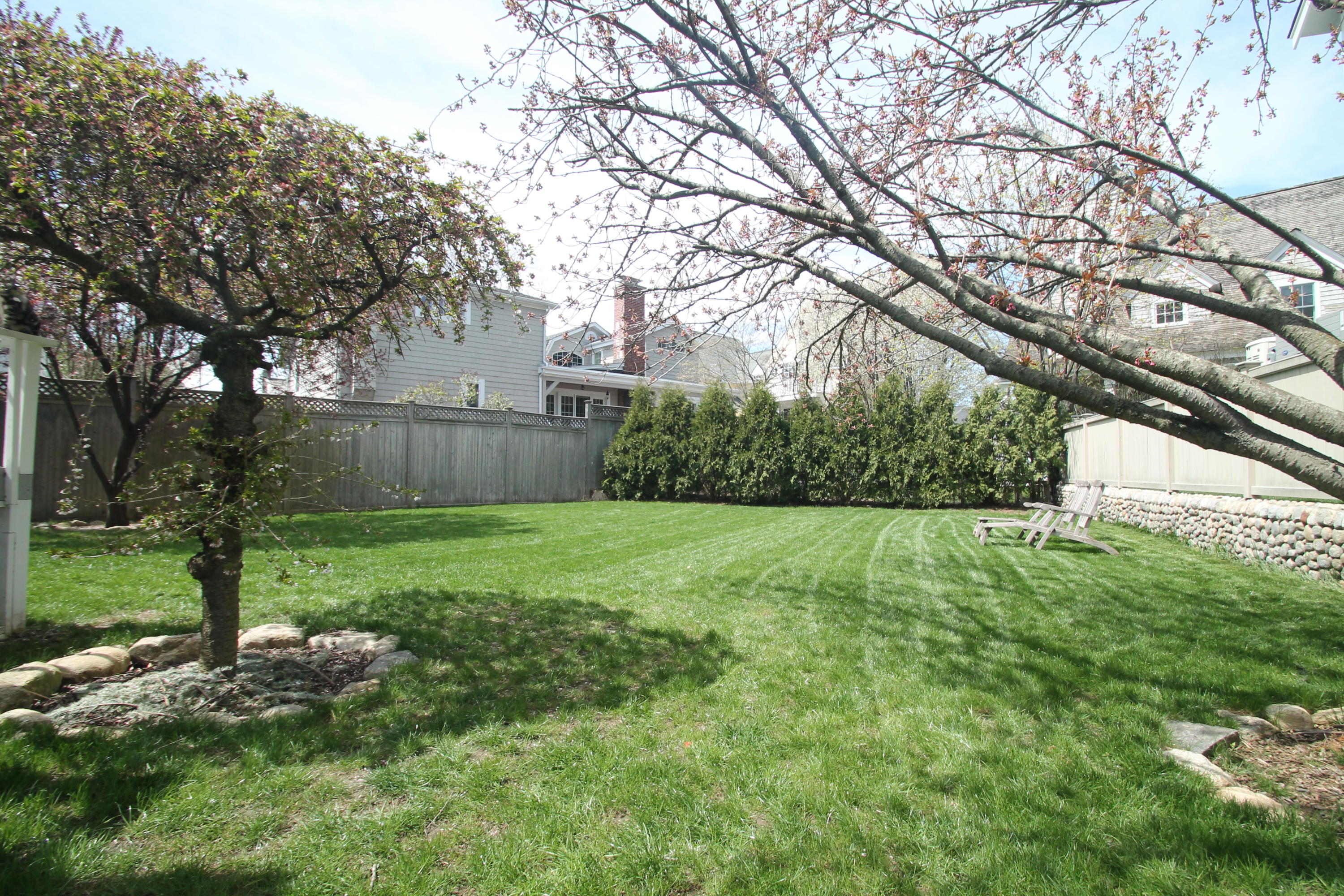 9 Juniper Road Rowayton, CT 06853 - Photo 25 of 25 a view of a backyard with large trees