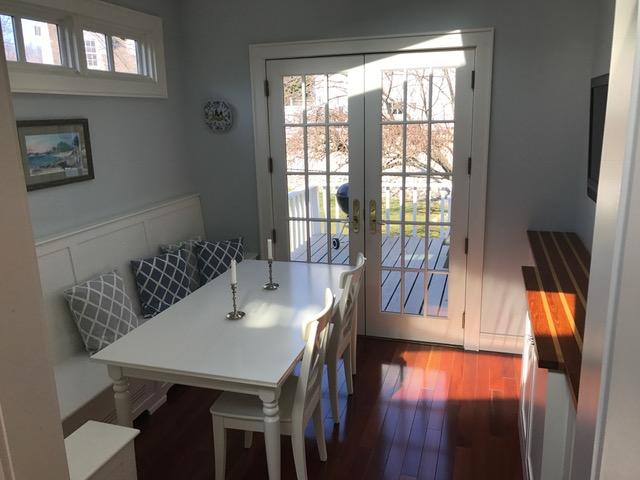 9 Juniper Road Rowayton, CT 06853 - Photo 7 of 25 a view of a dining room with furniture and wooden floor