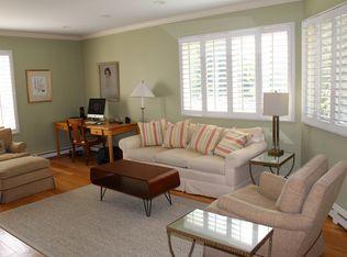 9 Juniper Road Rowayton, CT 06853 - Photo 8 of 25 a living room with furniture and a large window