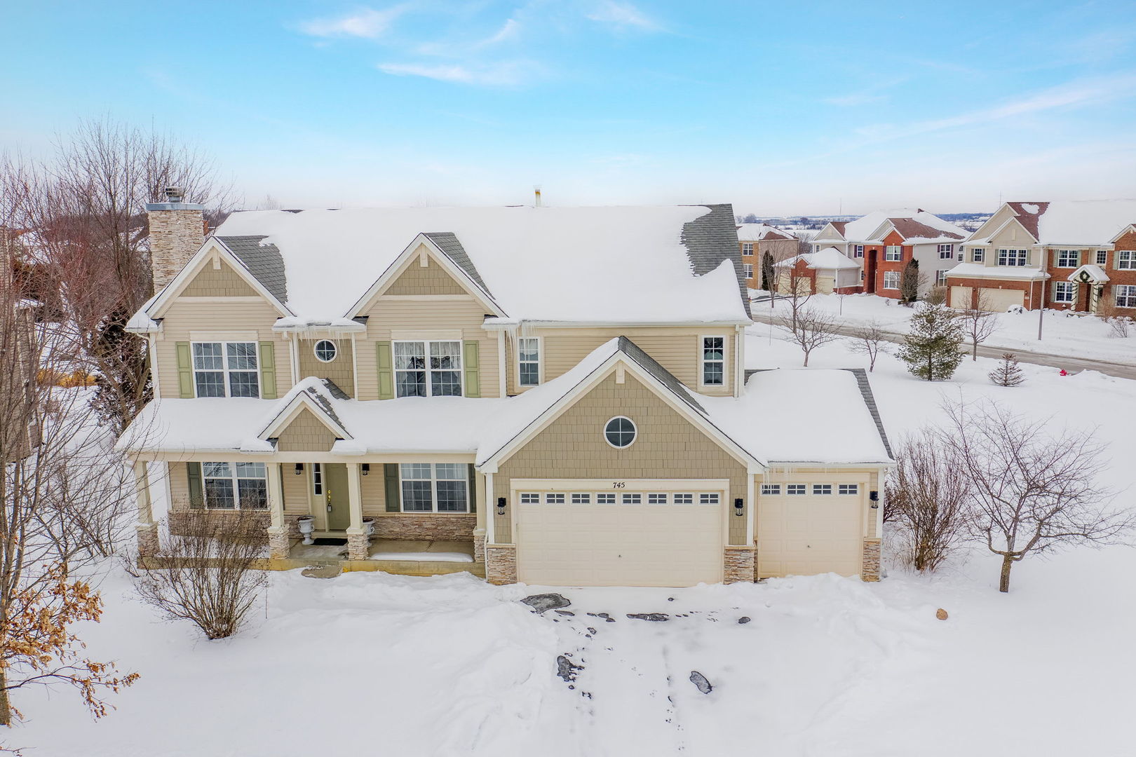 745 Boyce Road Sugar Grove, IL 60554 - Photo 1 of 38 a front view of a house with yard