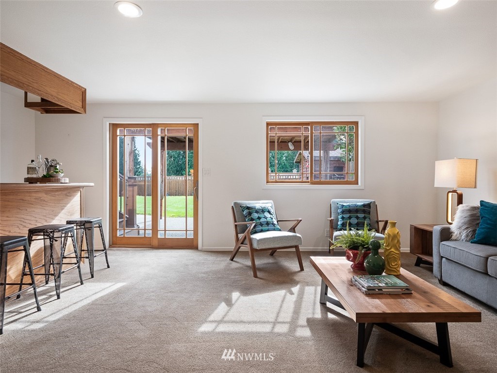 18 199th Place Southeast Bothell, WA 98012 - Photo 13 of 23 a living room with furniture and a window