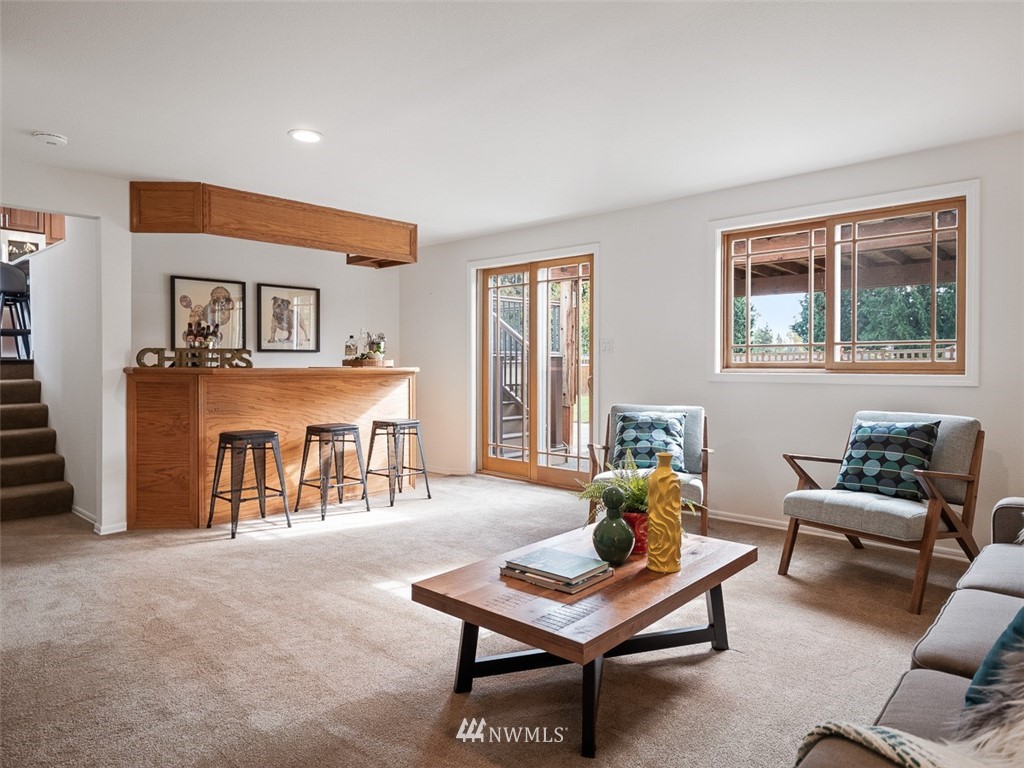 18 199th Place Southeast Bothell, WA 98012 - Photo 15 of 23 a living room with furniture and a table
