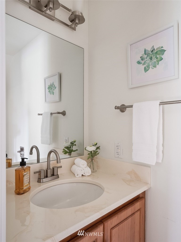 18 199th Place Southeast Bothell, WA 98012 - Photo 17 of 23 a bathroom with a sink and a mirror