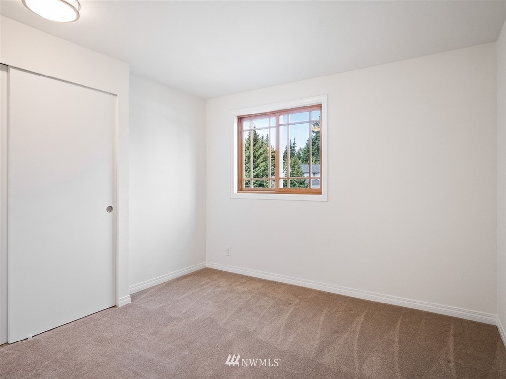 18 199th Place Southeast Bothell, WA 98012 - Photo 20 of 23 an empty room with windows