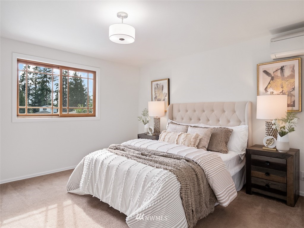 18 199th Place Southeast Bothell, WA 98012 - Photo 21 of 23 a bedroom with bed and a window