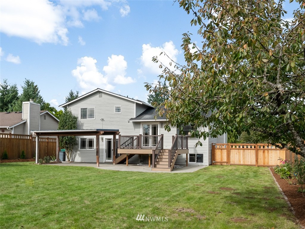 18 199th Place Southeast Bothell, WA 98012 - Photo 23 of 23 a view of house with yard and entertaining space