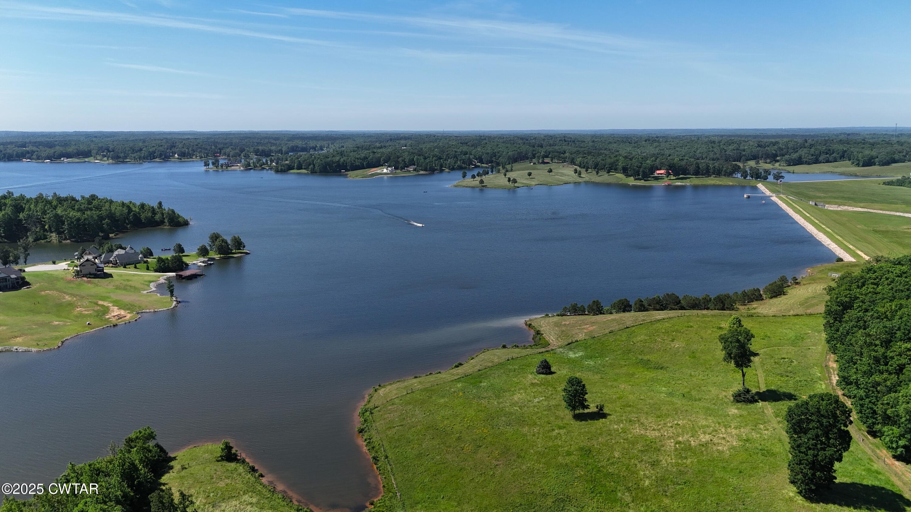 398 Baker Road Huntingdon, TN 38344 - Photo 17 of 23 an aerial view of a house with a garden