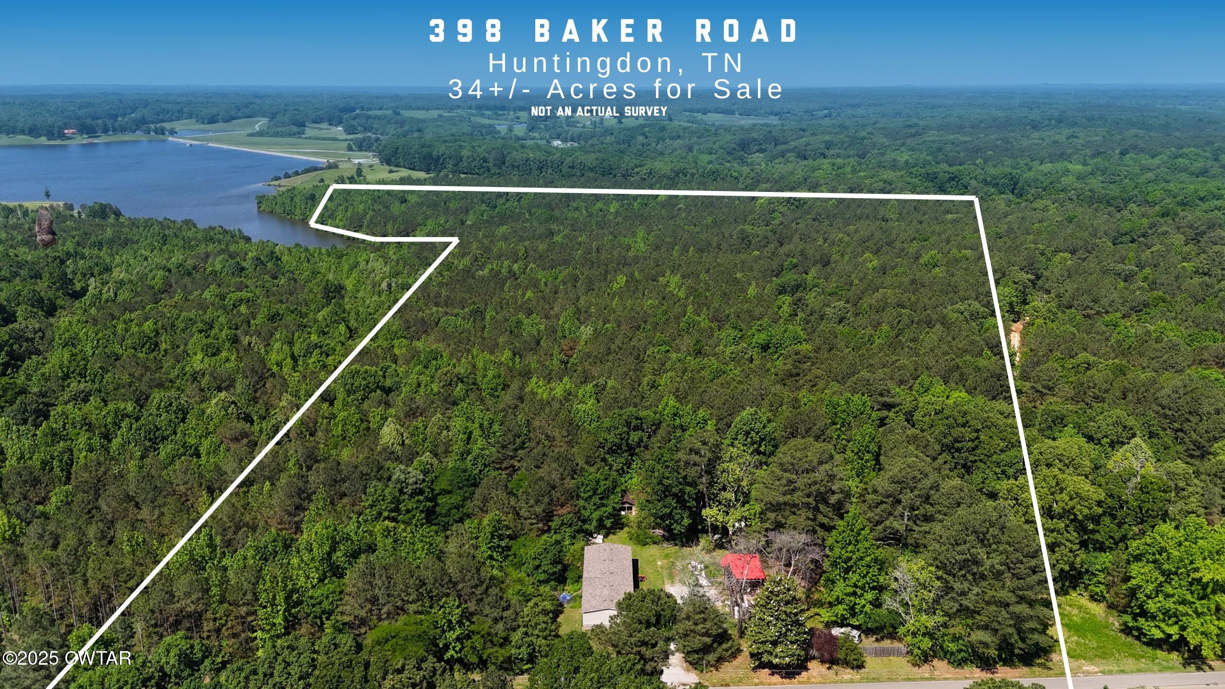 398 Baker Road Huntingdon, TN 38344 - Photo 2 of 23 a view of a tennis court