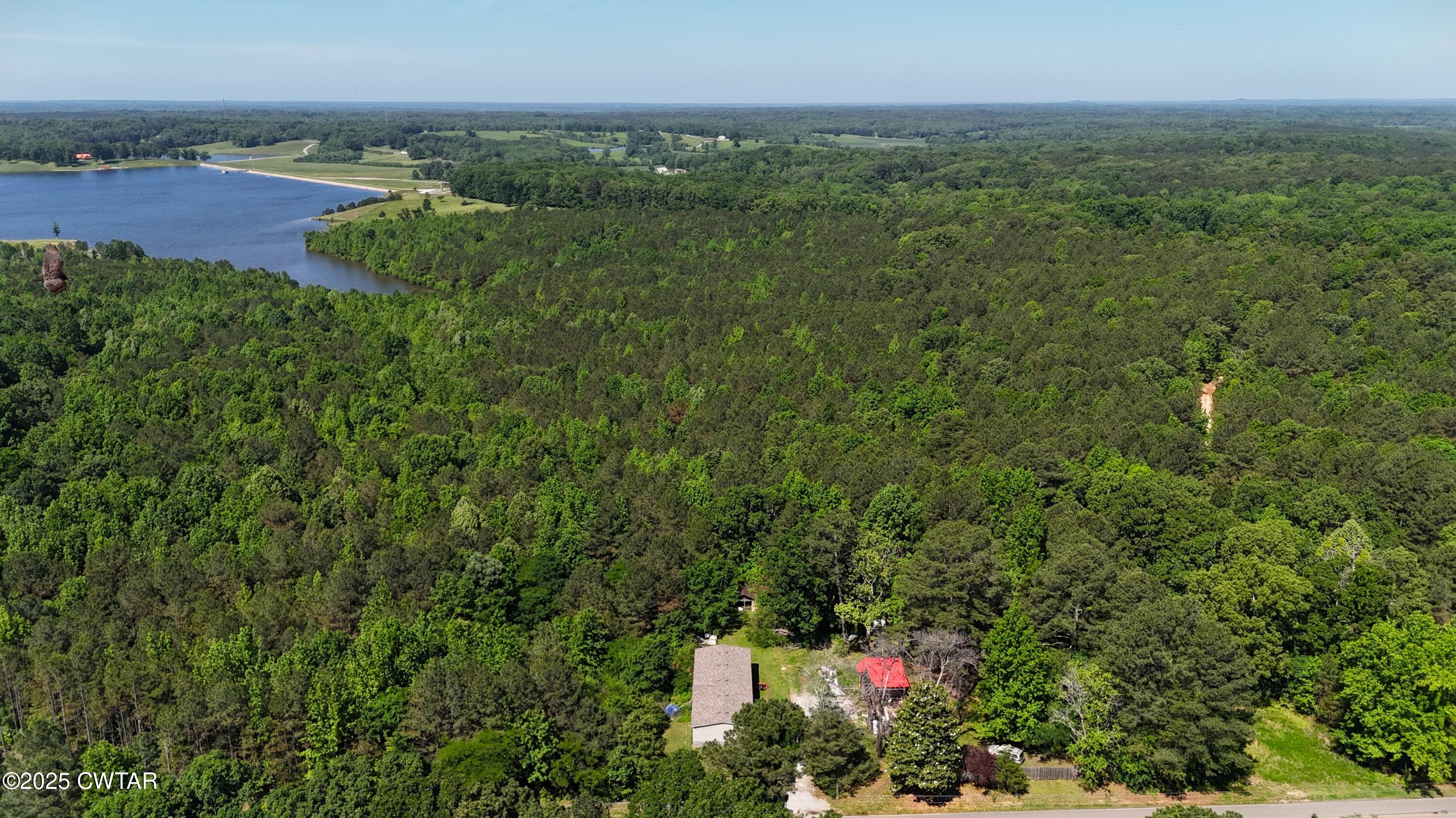 398 Baker Road Huntingdon, TN 38344 - Photo 22 of 23 an aerial view of a houses with a yard