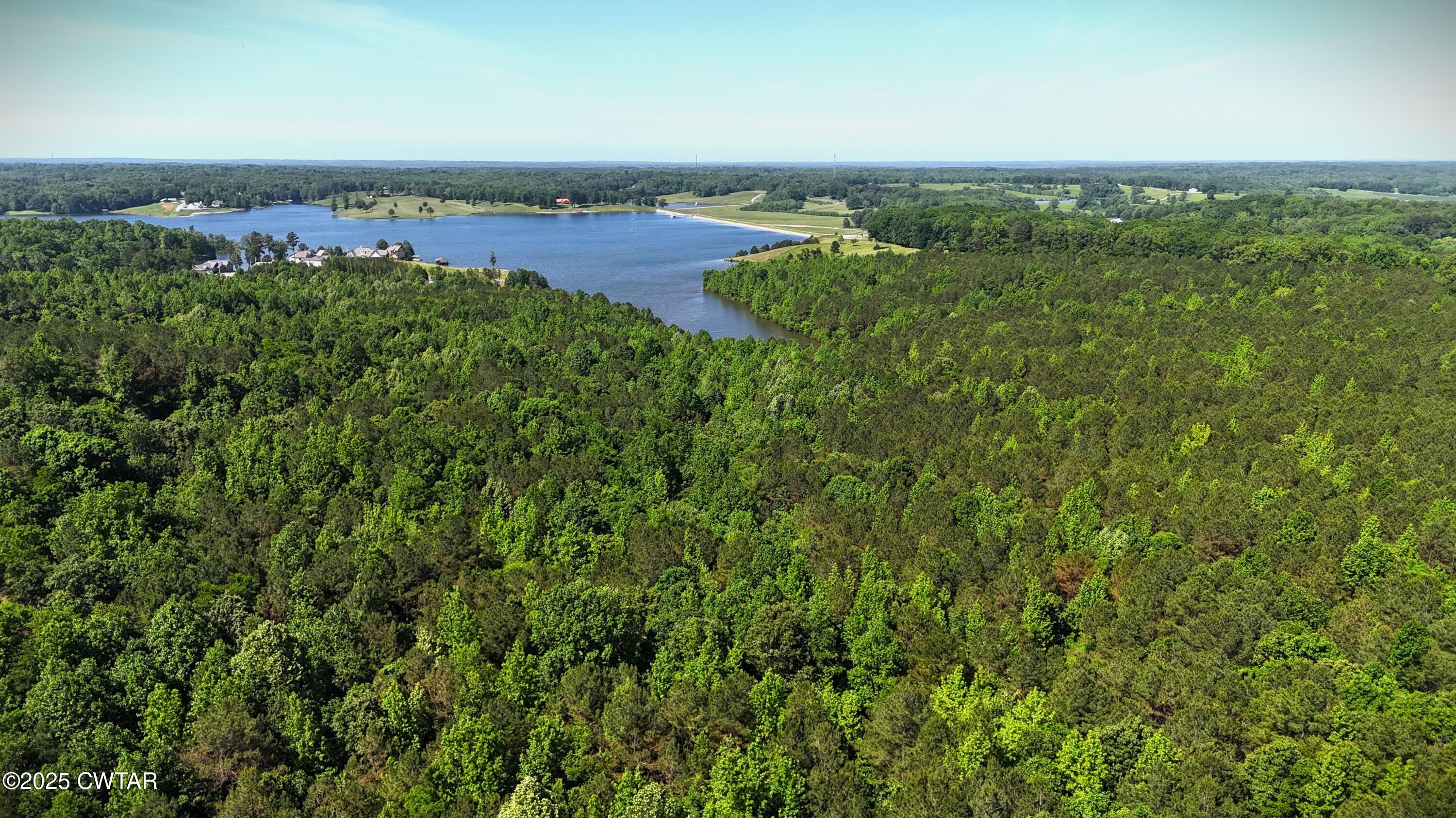 398 Baker Road Huntingdon, TN 38344 - Photo 4 of 23 an aerial view of a houses with a yard
