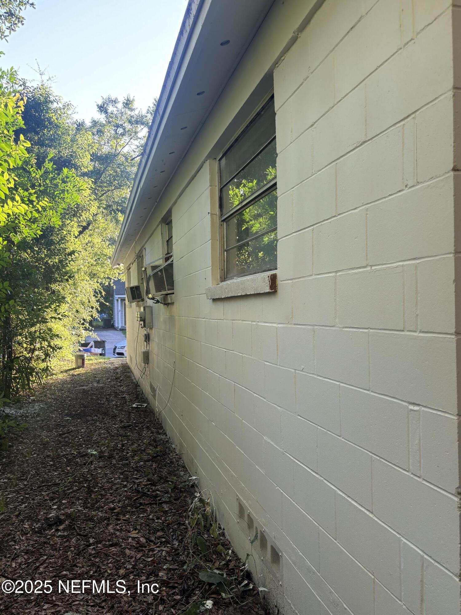 1115 Rushing Street Jacksonville, FL 32209 - Photo 23 of 24 a view of a pathway both side of house