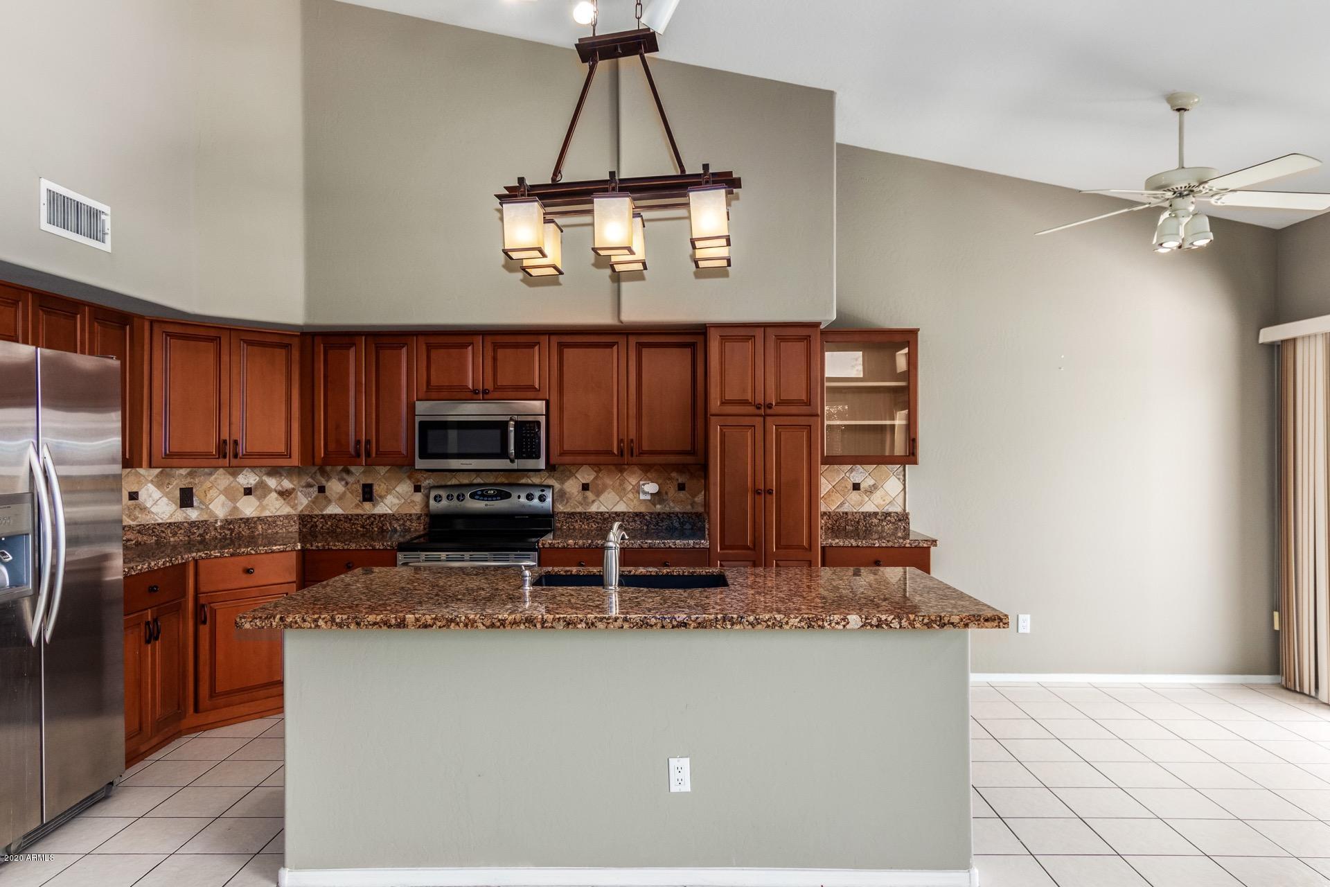 1256 East Redfield Road Phoenix, AZ 85022 - Photo 13 of 27 Kitchen w/ granite counters