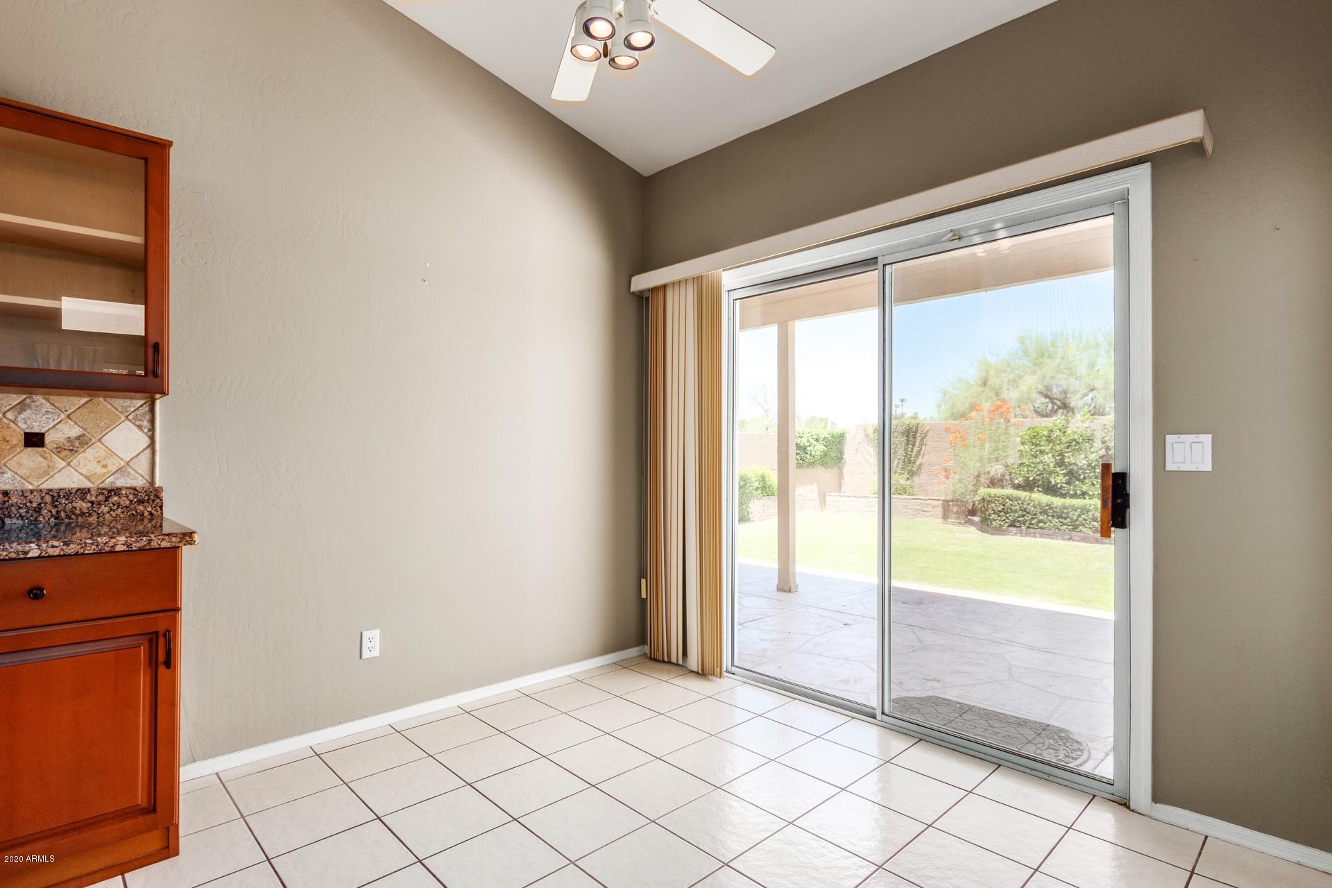 1256 East Redfield Road Phoenix, AZ 85022 - Photo 20 of 27 Eat-in kitchen & access to backyard
