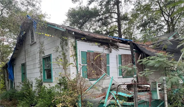 a backyard of a house with seating space