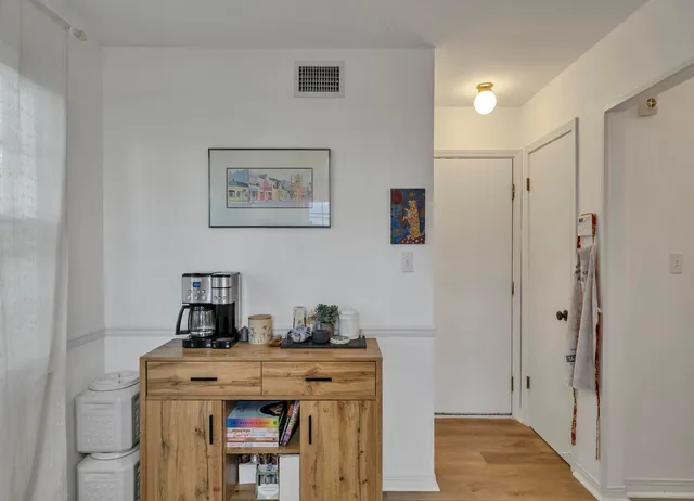 a view of a hallway with workspace