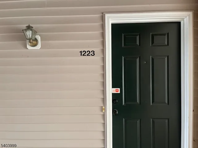 a sign broad next to a road