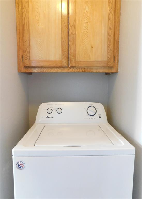 2214 Bernard Street Denton, TX 76205 - Photo 13 of 16 a utility room with dryer and washer