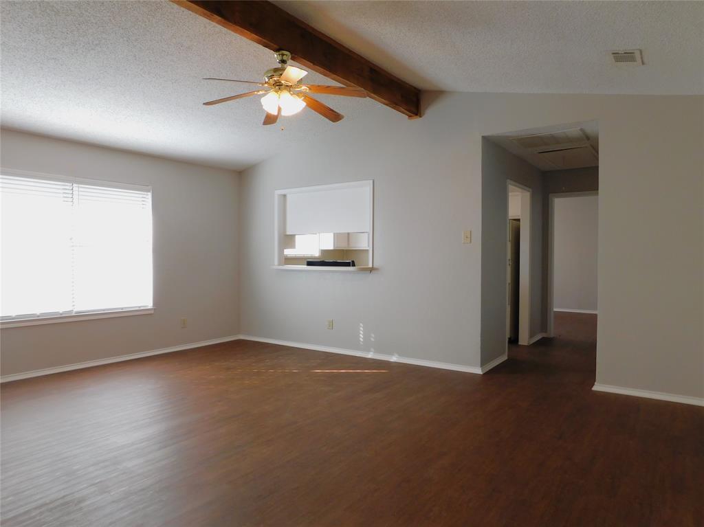 2214 Bernard Street Denton, TX 76205 - Photo 5 of 16 a view of an empty room with a window