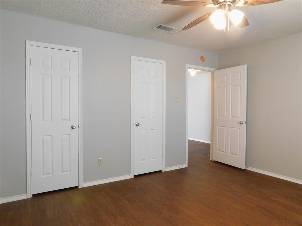 2214 Bernard Street Denton, TX 76205 - Photo 10 of 16 wooden floor in an empty room