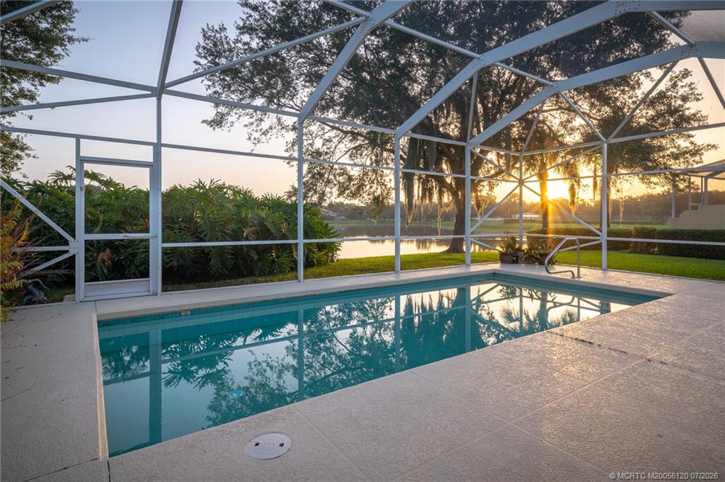 1313 Southwest Balmoral Trace Stuart, FL 34997 - Photo 9 of 70 Sunrise, the day begins - time for a few laps in the pool