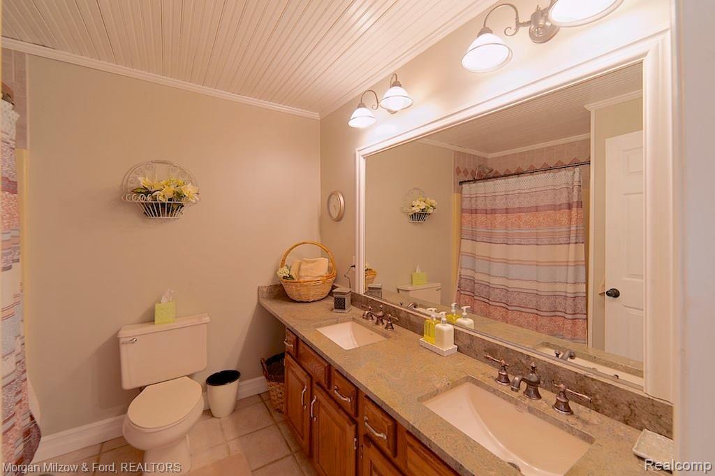 3595 Jossman Road Holly, MI 48442 - Photo 25 of 49 Guest bath w/dual vanities, granite & new fixtures