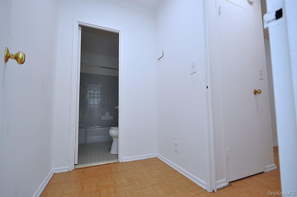 281 Garth Road, Unit B6D Scarsdale, NY 10583 - Photo 18 of 35 Dressing area has a walk-in closet and leads to the bathroom