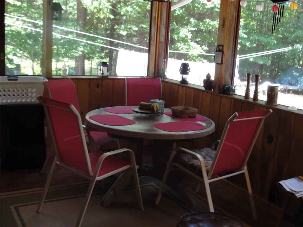 12 Chickadee Road Bridgton, ME 04009 - Photo 26 of 35 Summer dining in the screened porch...