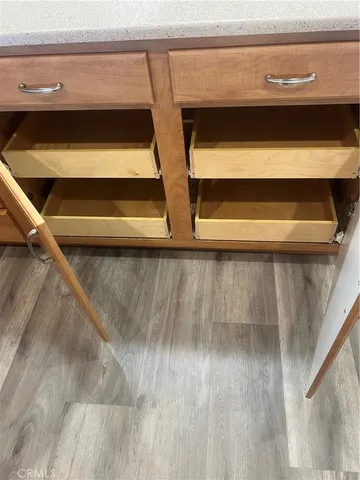 a white refrigerator freezer sitting inside of a kitchen