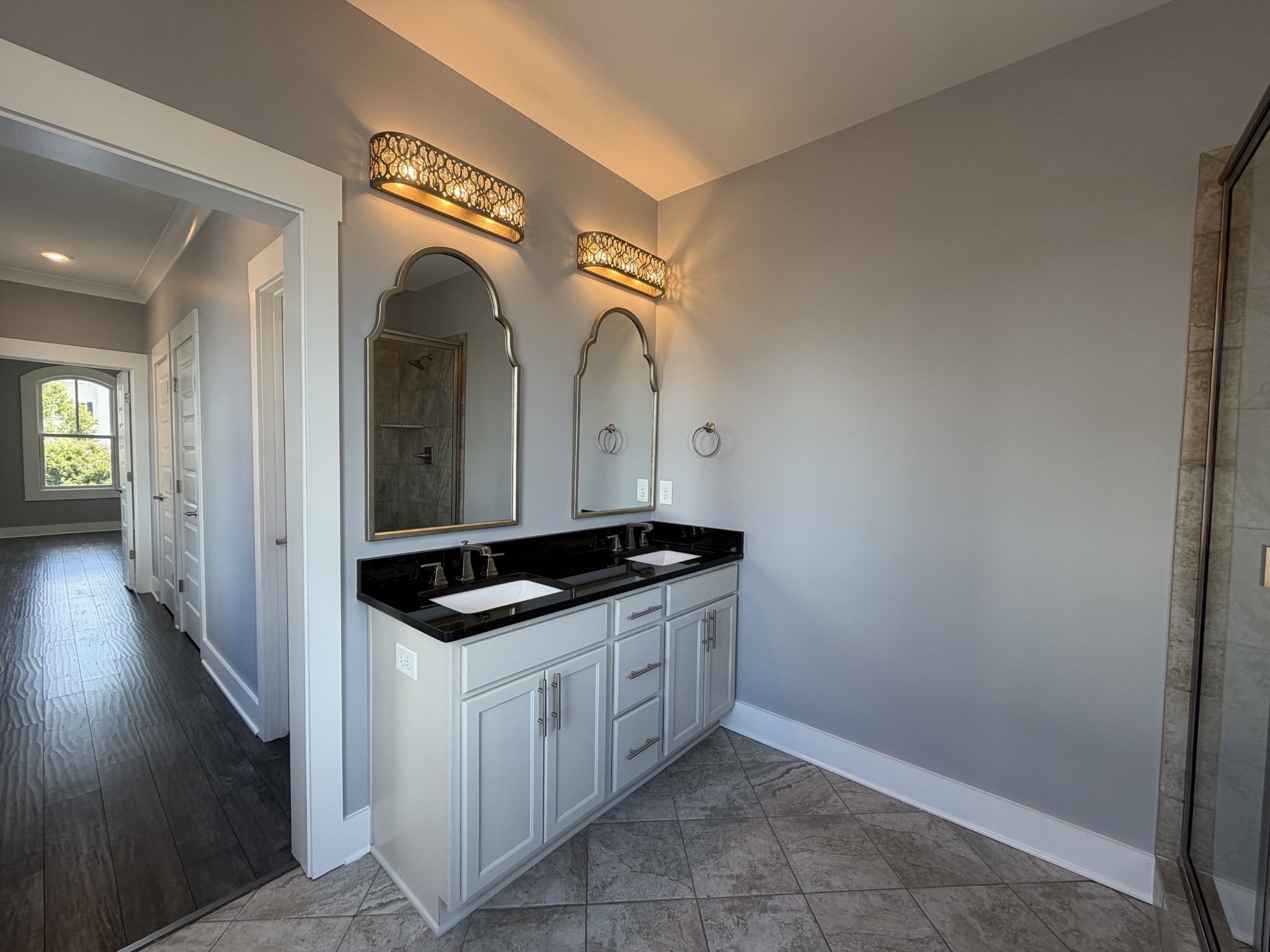 3097 Rural Plains Circle Franklin, TN 37064 - Photo 17 of 28 a kitchen with granite countertop a sink and cabinets
