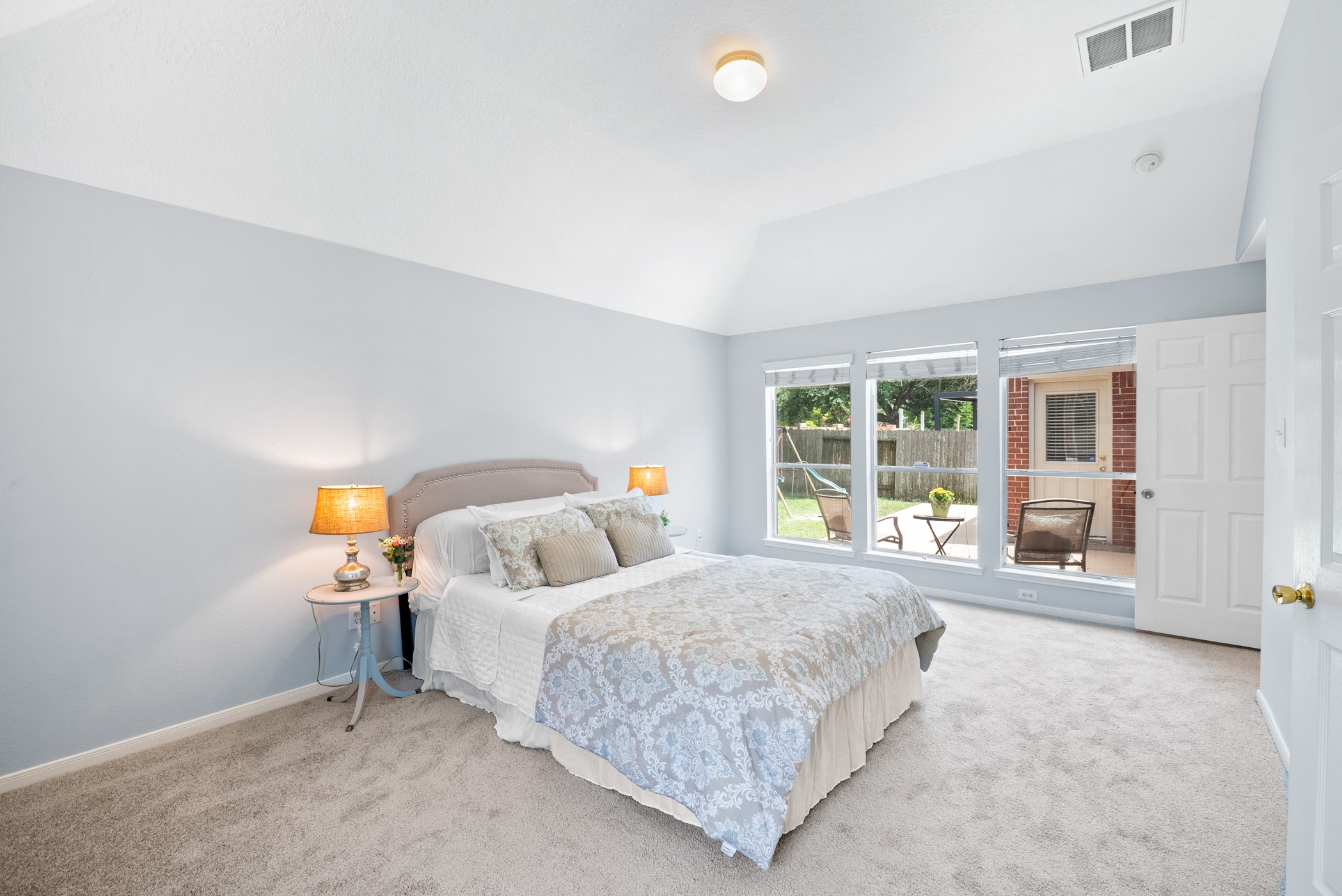 2914 Intrepid Elm Street Houston, TX 77084 - Photo 14 of 32 a bedroom with a bed and a large window