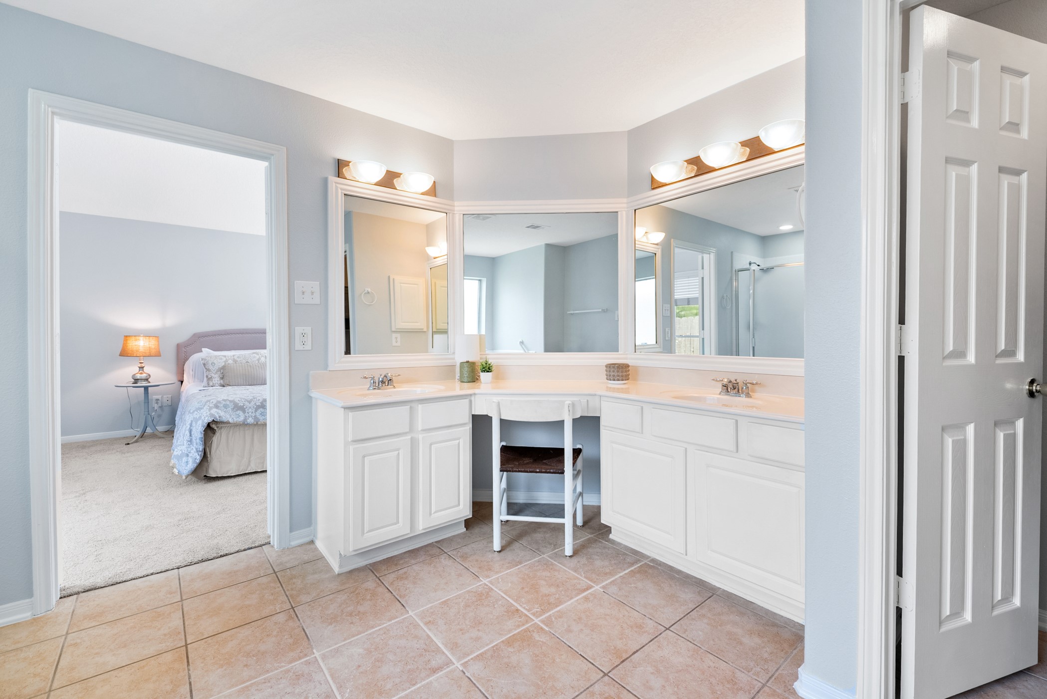 2914 Intrepid Elm Street Houston, TX 77084 - Photo 17 of 32 a spacious bathroom with a double vanity sink mirror and a