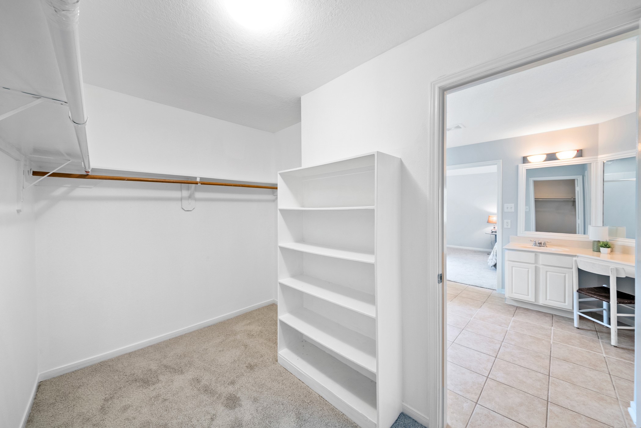 2914 Intrepid Elm Street Houston, TX 77084 - Photo 18 of 32 a view of a bedroom with a furniture and a window