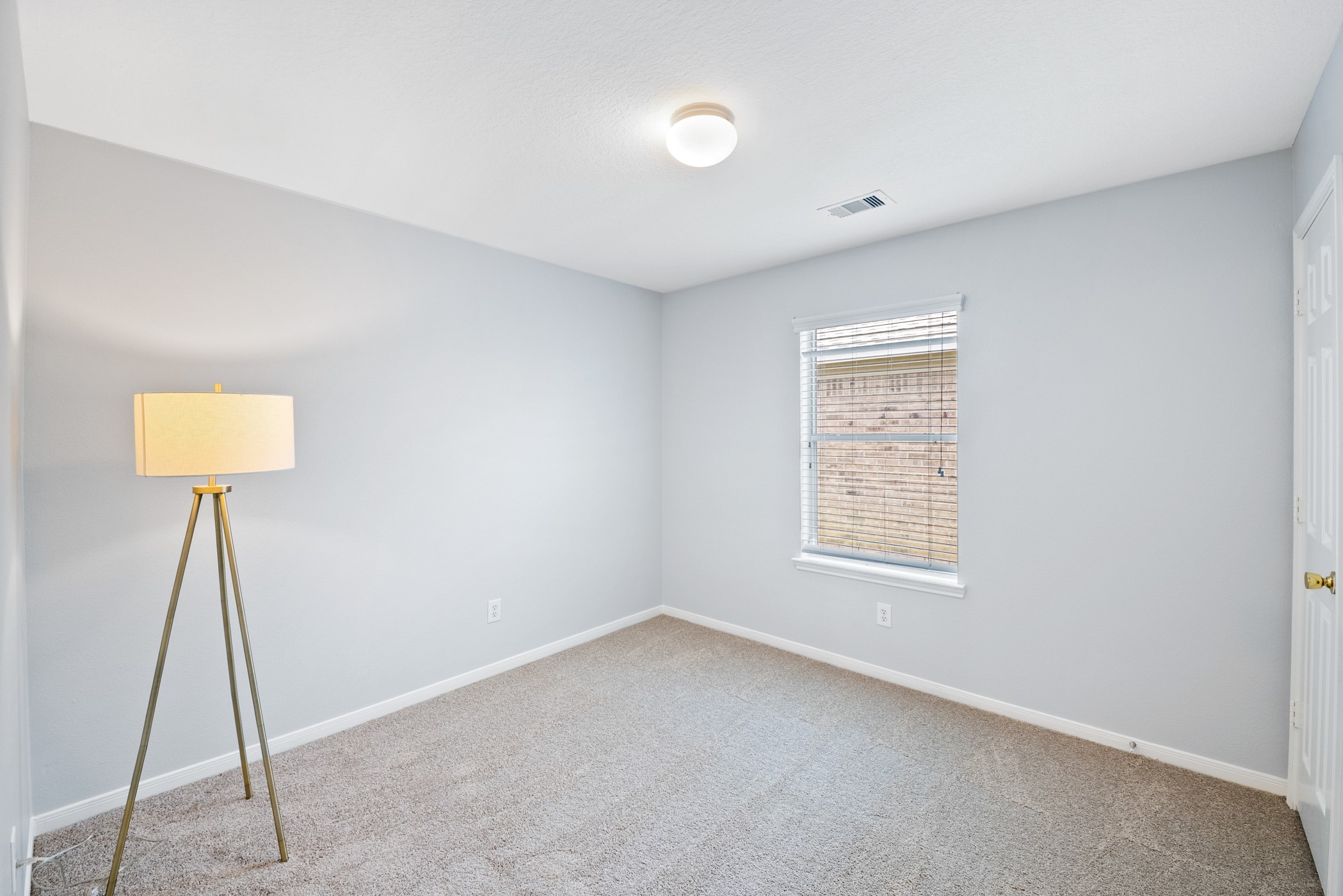 2914 Intrepid Elm Street Houston, TX 77084 - Photo 25 of 32 a view of an empty room and a window
