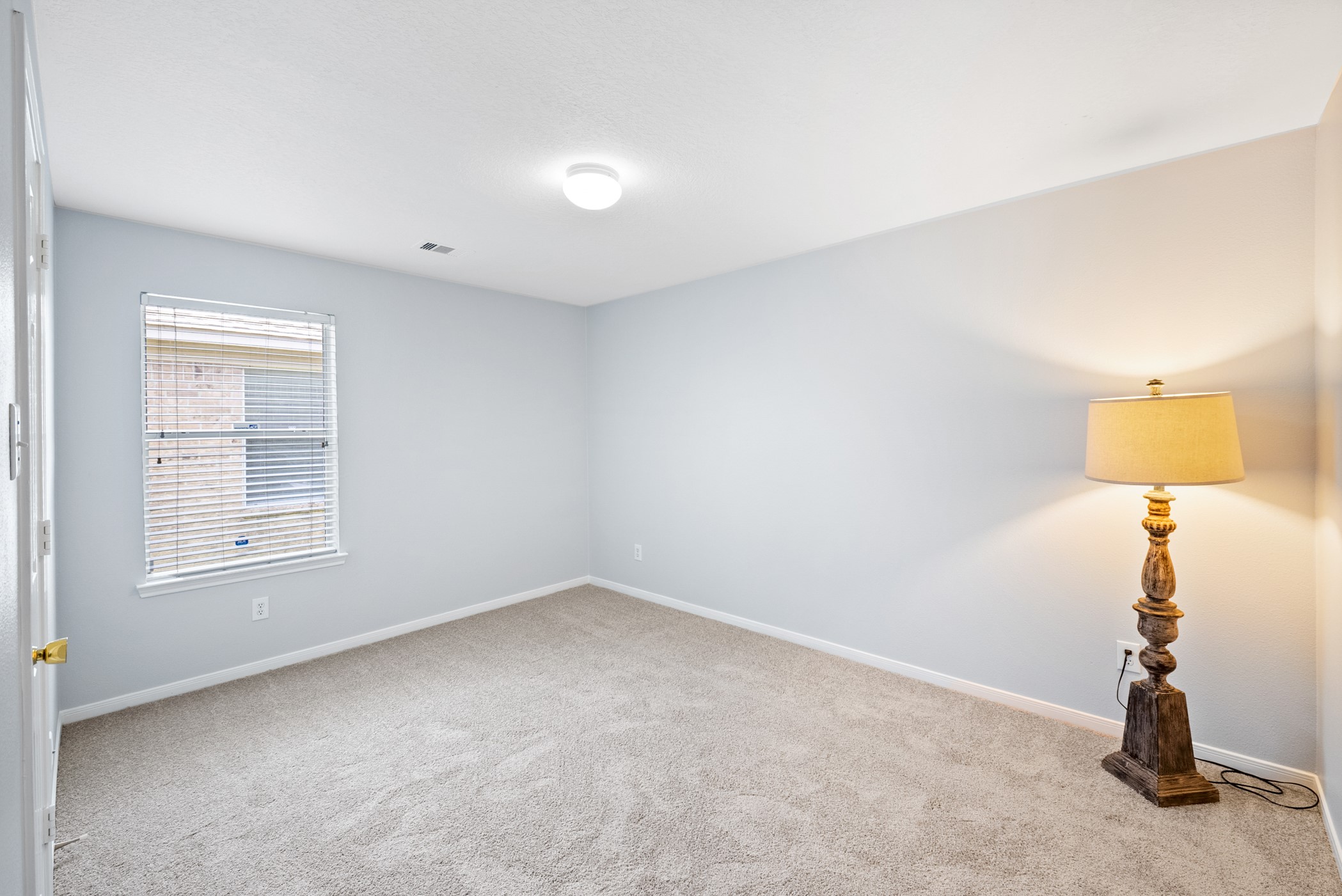 2914 Intrepid Elm Street Houston, TX 77084 - Photo 26 of 32 an empty room with windows