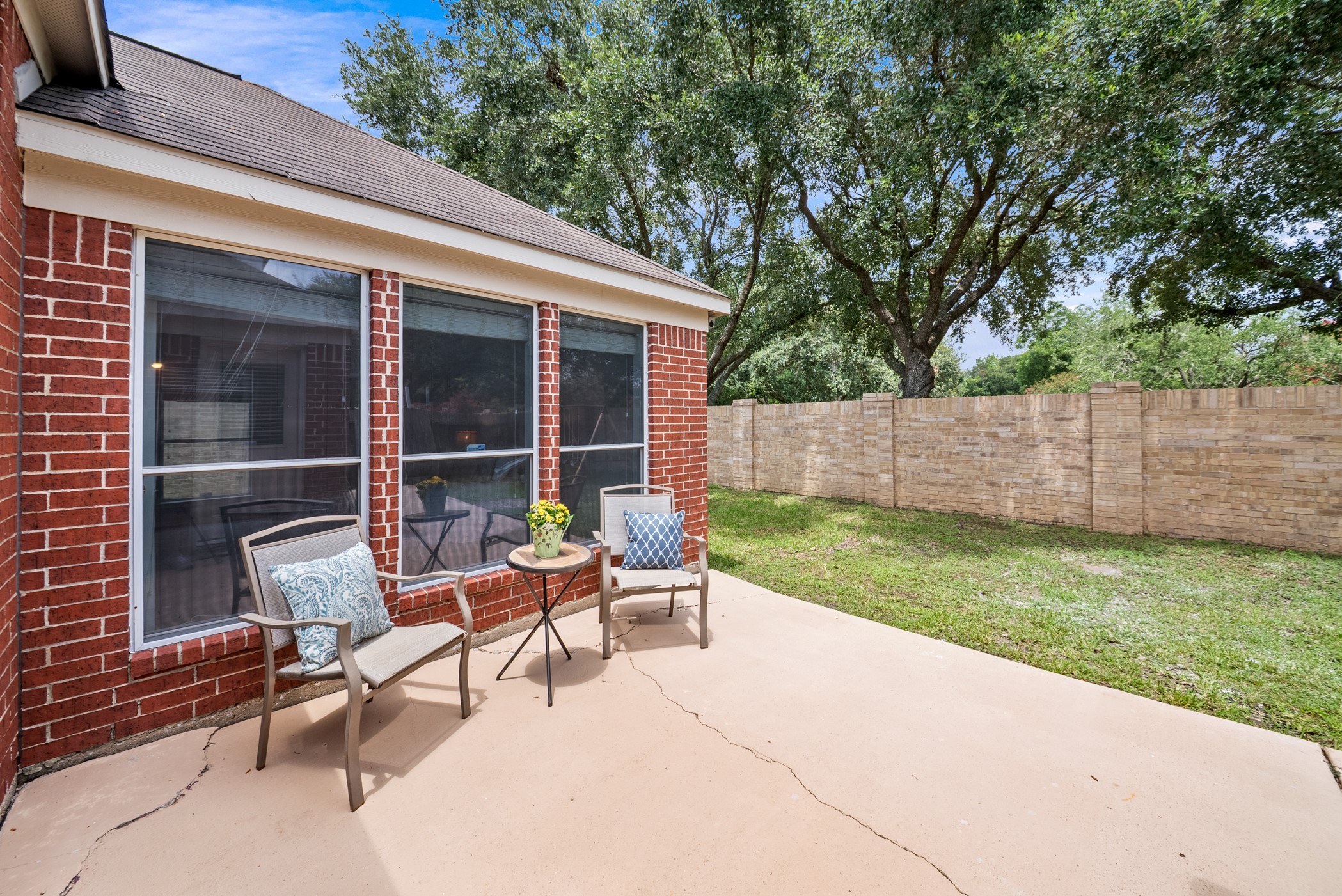 2914 Intrepid Elm Street Houston, TX 77084 - Photo 29 of 32 a view of a house with backyard sitting area and garden