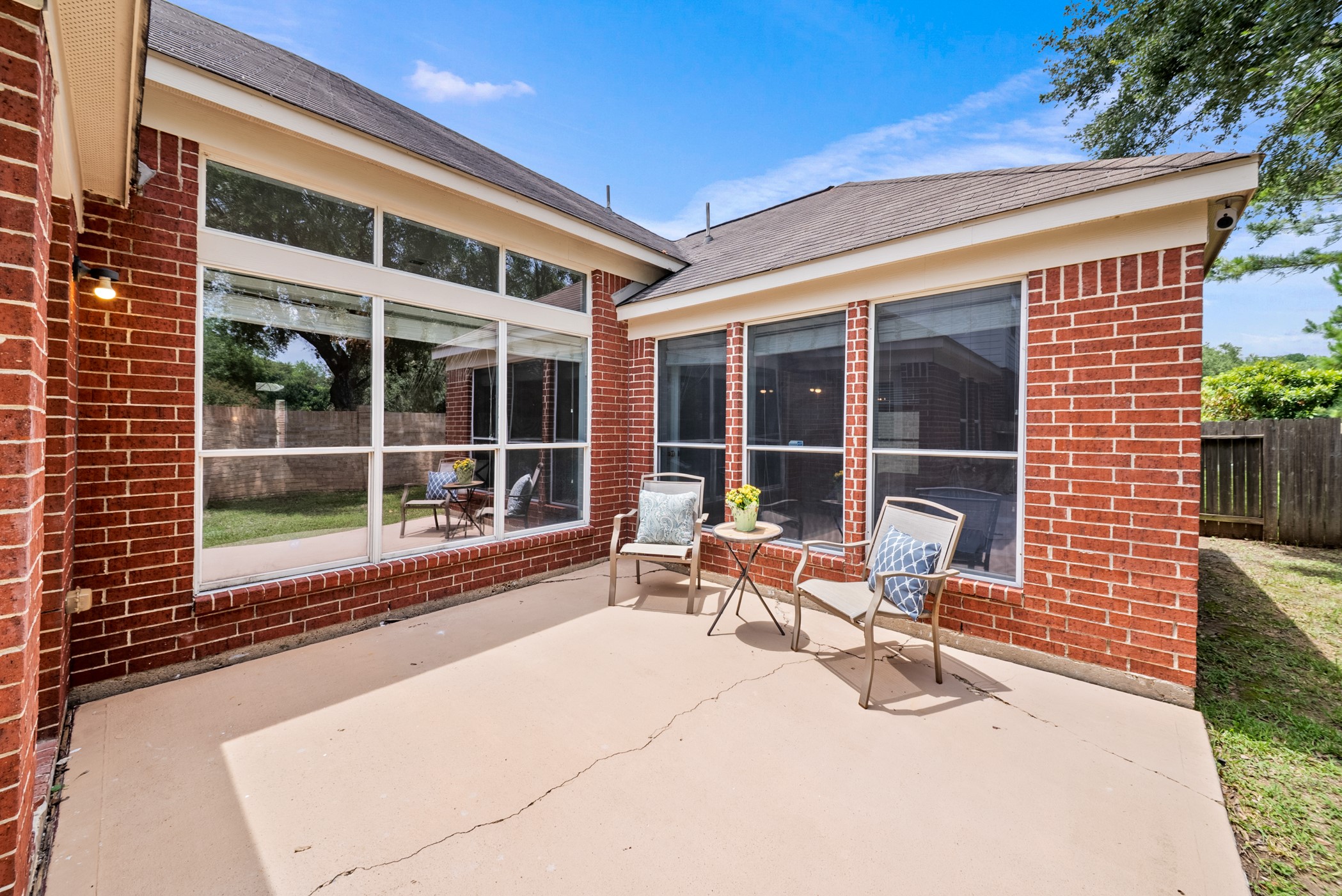 2914 Intrepid Elm Street Houston, TX 77084 - Photo 30 of 32 a balcony with a couch and large windows