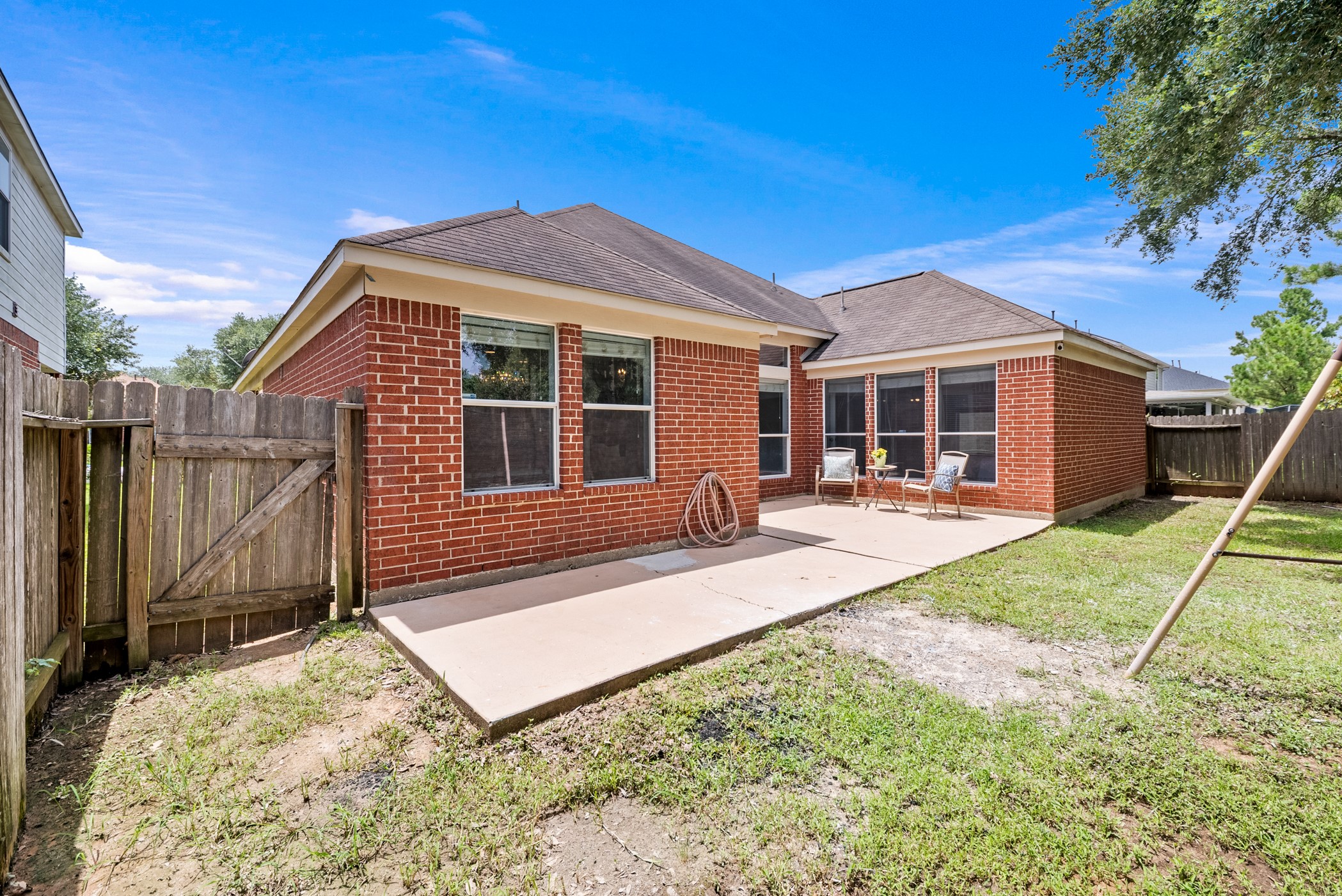 2914 Intrepid Elm Street Houston, TX 77084 - Photo 32 of 32 a view of a house with a backyard