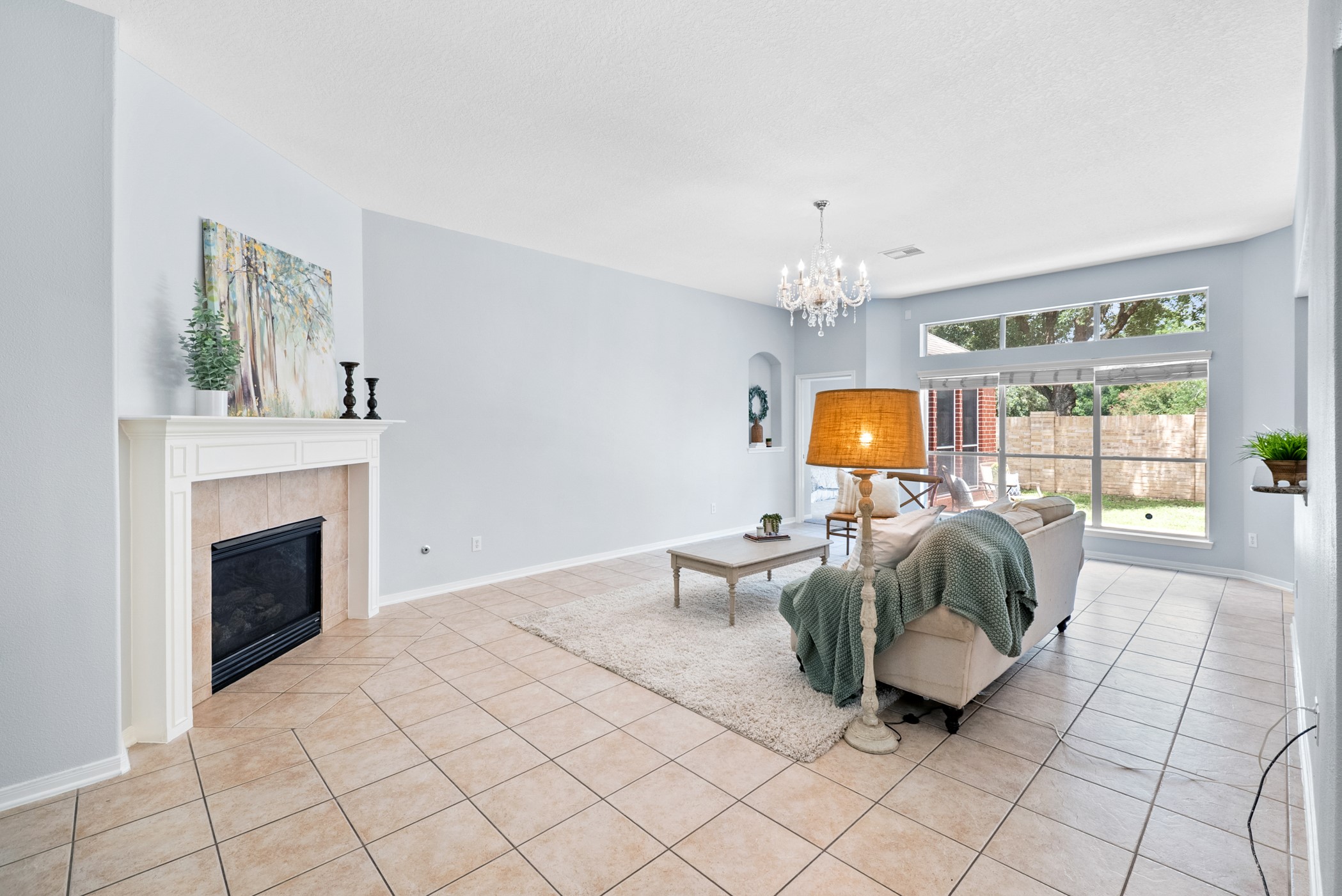 2914 Intrepid Elm Street Houston, TX 77084 - Photo 6 of 32 a living room with furniture and a fireplace