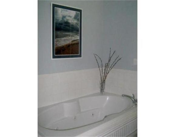 270 Old Gilbertville Road Ware, MA 01082 - Photo 16 of 30 a bath tub sitting in a bathroom