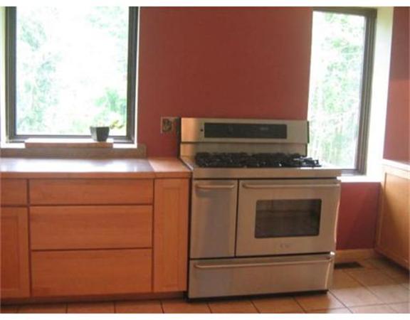 270 Old Gilbertville Road Ware, MA 01082 - Photo 26 of 30 a kitchen with a stove and a sink