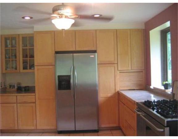 270 Old Gilbertville Road Ware, MA 01082 - Photo 4 of 30 a kitchen with cabinets and stainless steel appliances