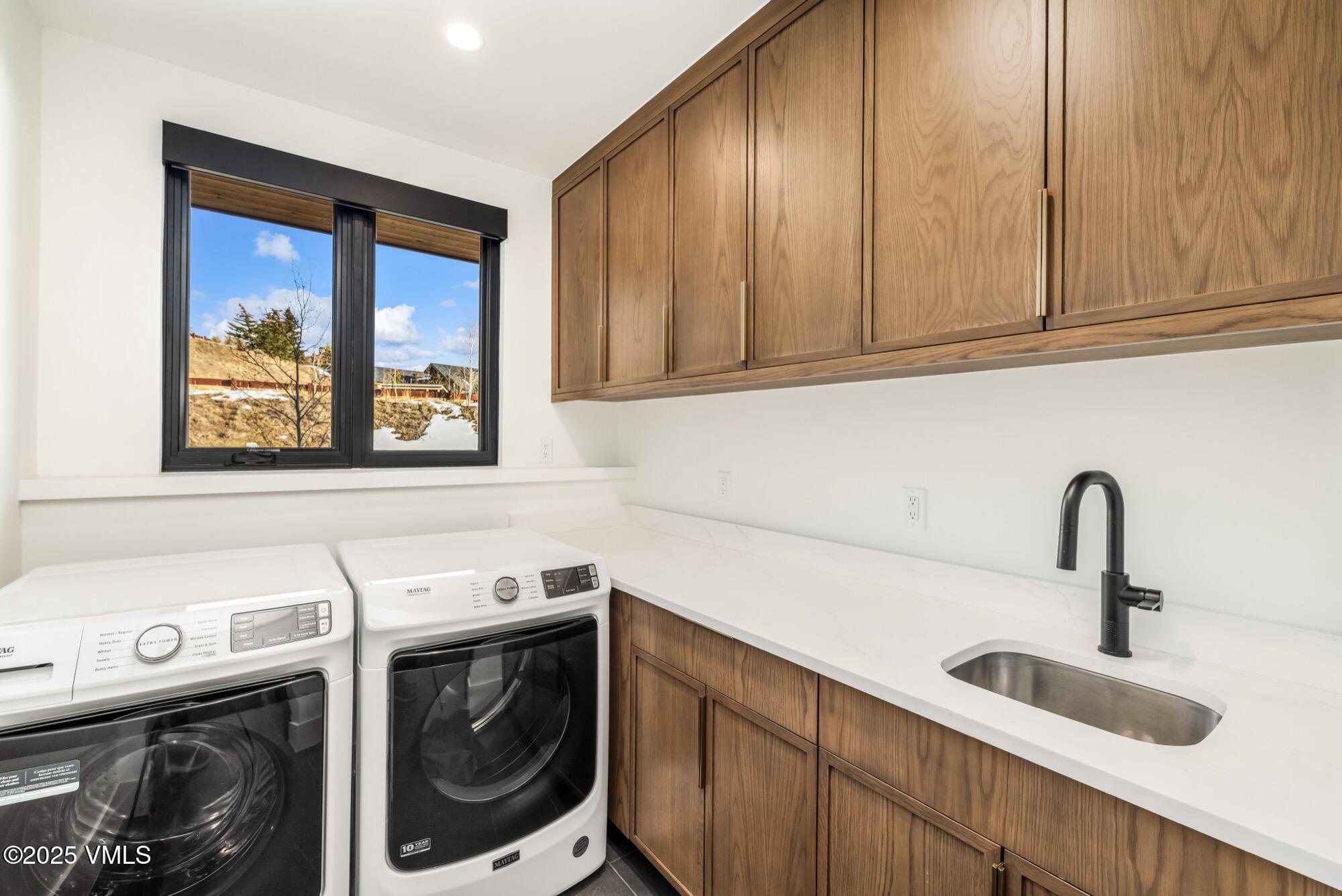100 Legends Drive, Unit D Edwards, CO 81632 - Photo 35 of 37 a kitchen with a stove and a sink