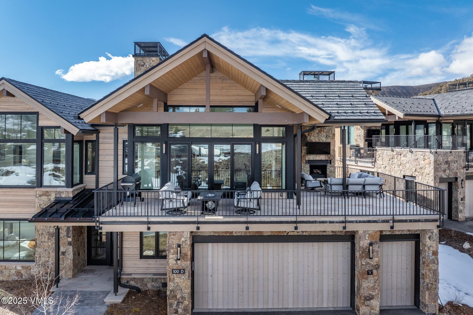 100 Legends Drive, Unit D Edwards, CO 81632 - Photo 10 of 37 a group of people sitting in front of a building
