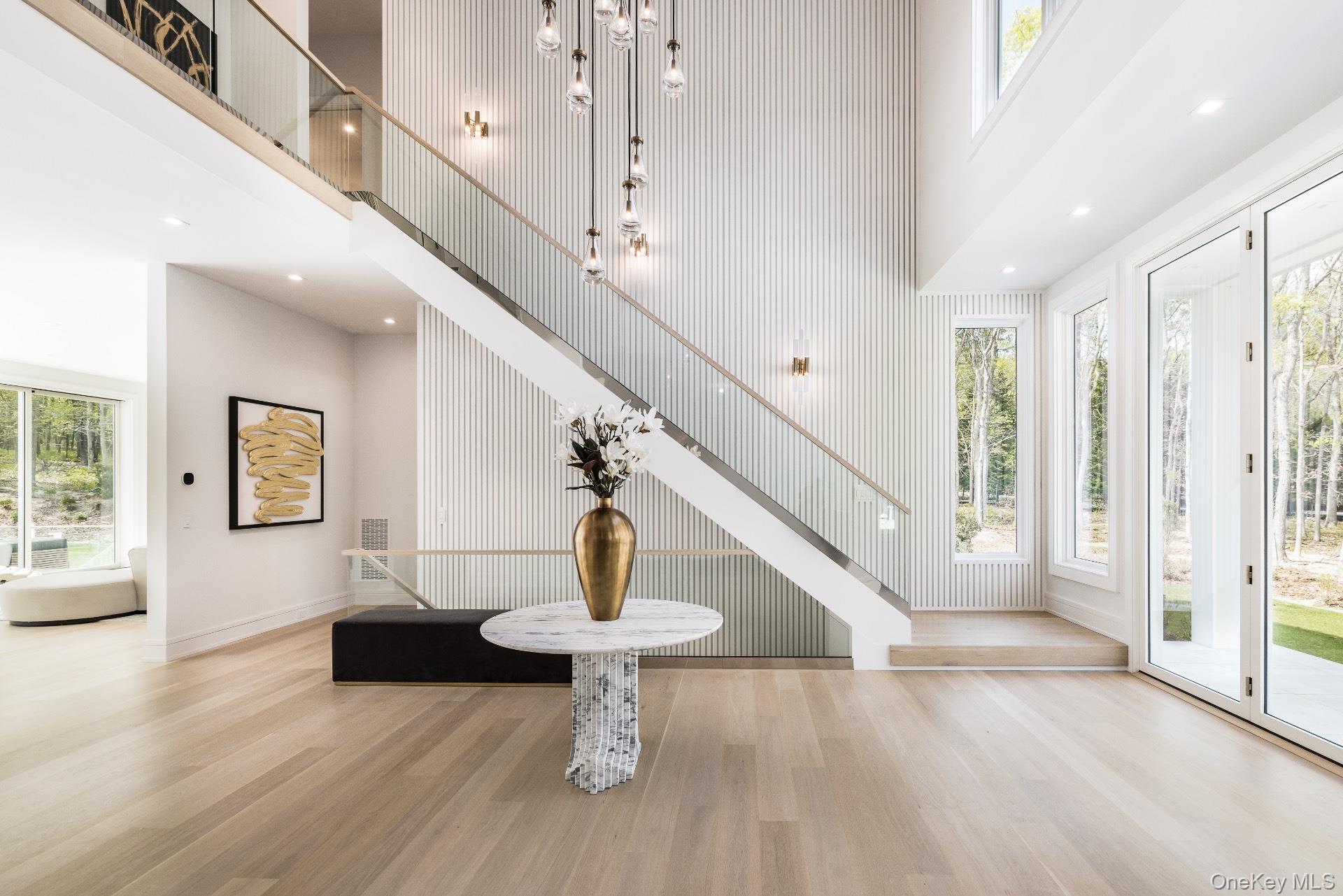 1552 Deerfield Road Water Mill, NY 11976 - Photo 17 of 37 a view of entryway and hall with wooden floor