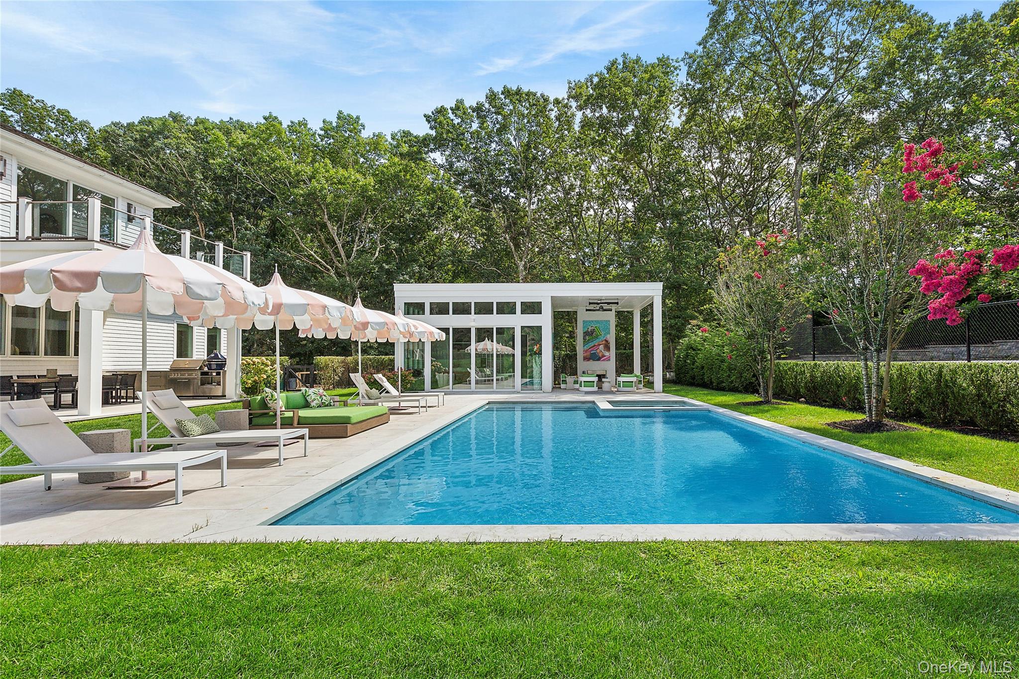 1552 Deerfield Road Water Mill, NY 11976 - Photo 3 of 37 a view of a house with swimming pool and sitting area