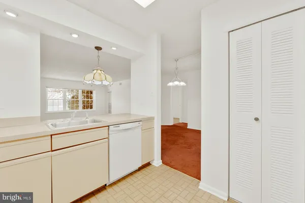 a bathroom with a double vanity sink mirror and