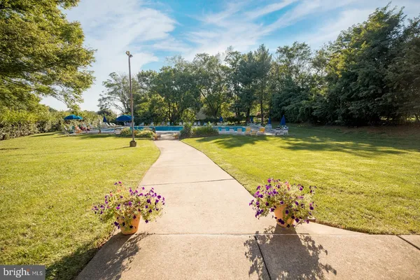 a view of an outdoor space and swimming pool